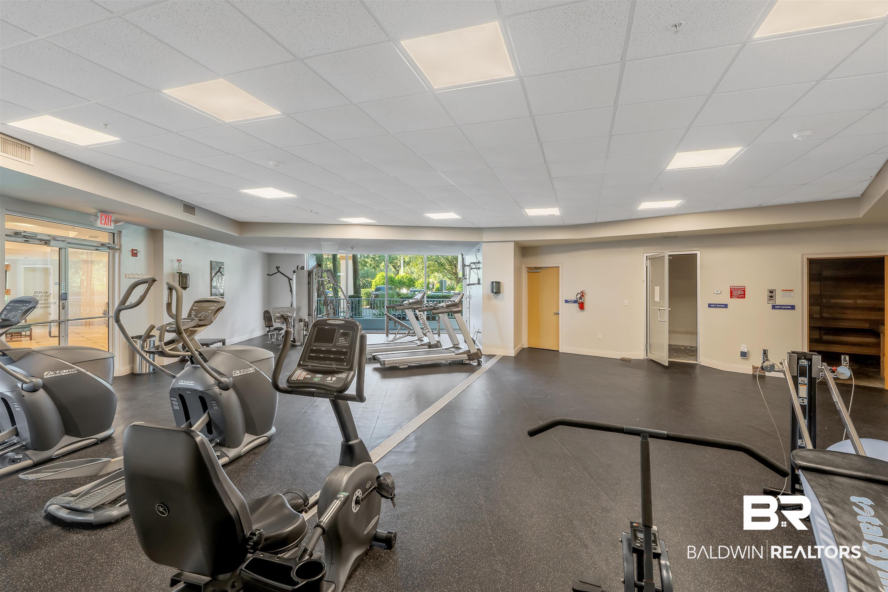 27800 Canal Road, Unit 113 Orange Beach, AL 36561 - Photo 23 of 35 Workout area featuring a paneled ceiling