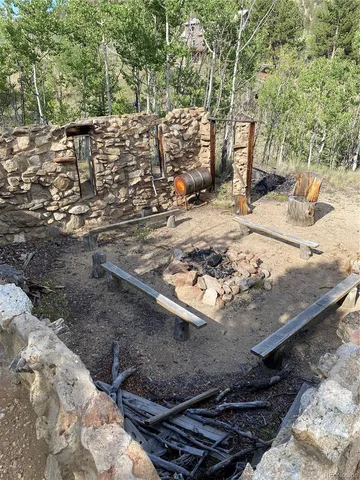 a view of a backyard of the house