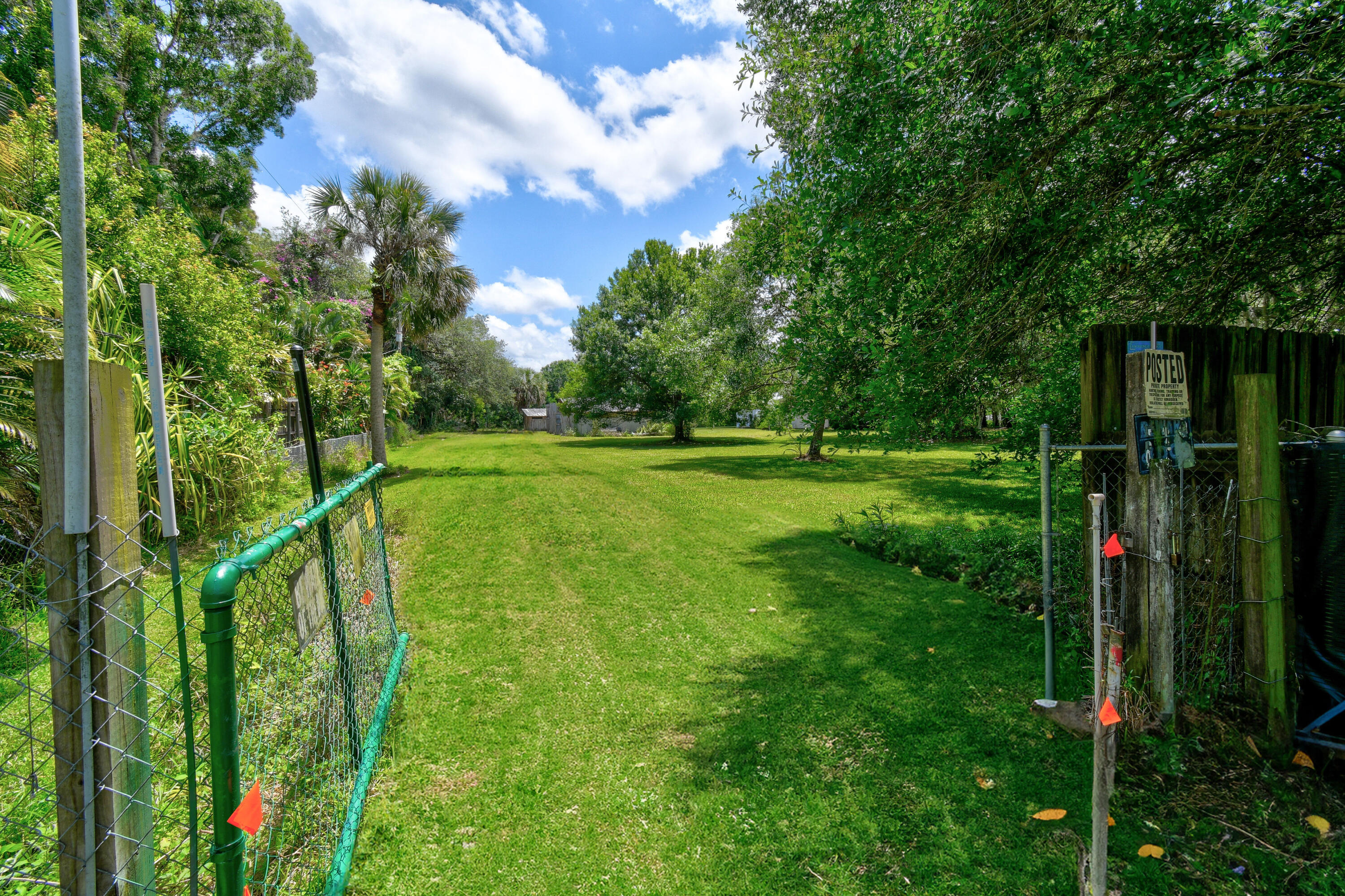 332 Southwest Salerno Road Stuart, FL 34997 - Photo 6 of 17 a view of an outdoor space and a yard