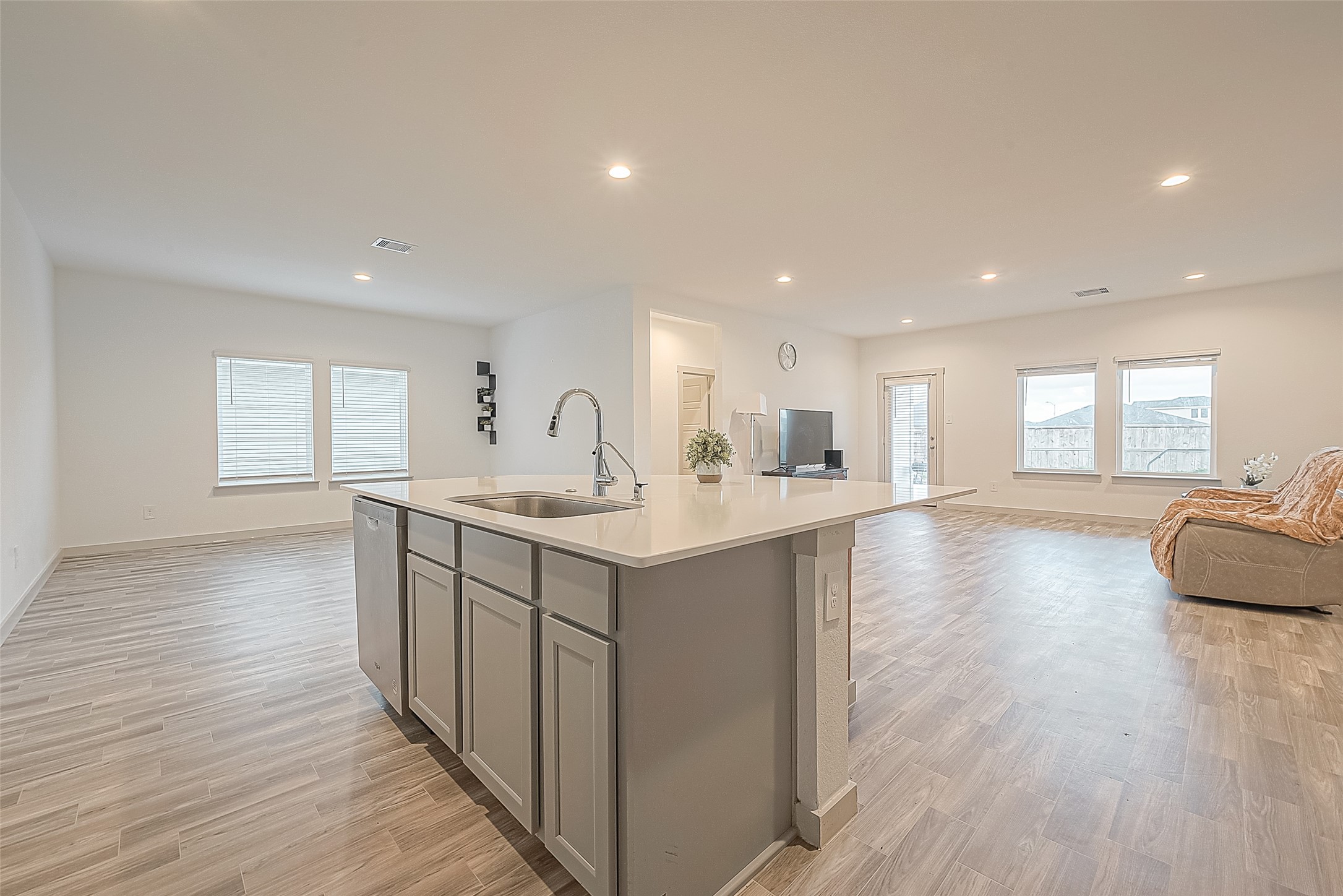 1815 Sandy Trail Lane Rosenberg, TX 77469 - Photo 17 of 47 a kitchen with a sink and wooden floor
