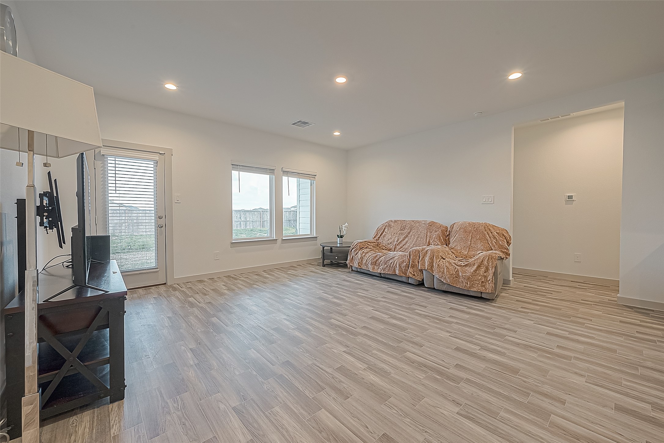 1815 Sandy Trail Lane Rosenberg, TX 77469 - Photo 20 of 47 a living room with furniture and a wooden floor