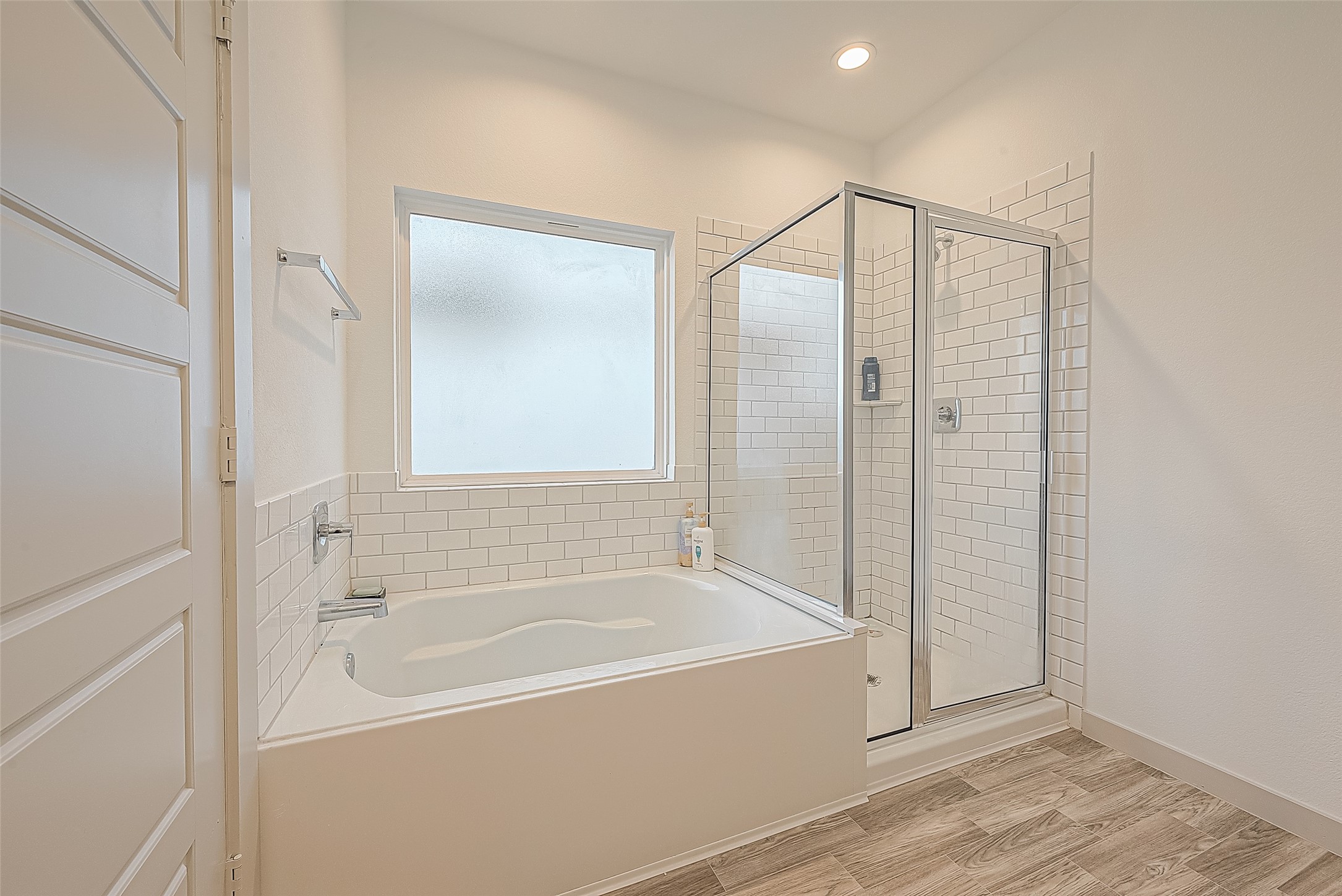 1815 Sandy Trail Lane Rosenberg, TX 77469 - Photo 25 of 47 a bathroom with a bathtub and a shower