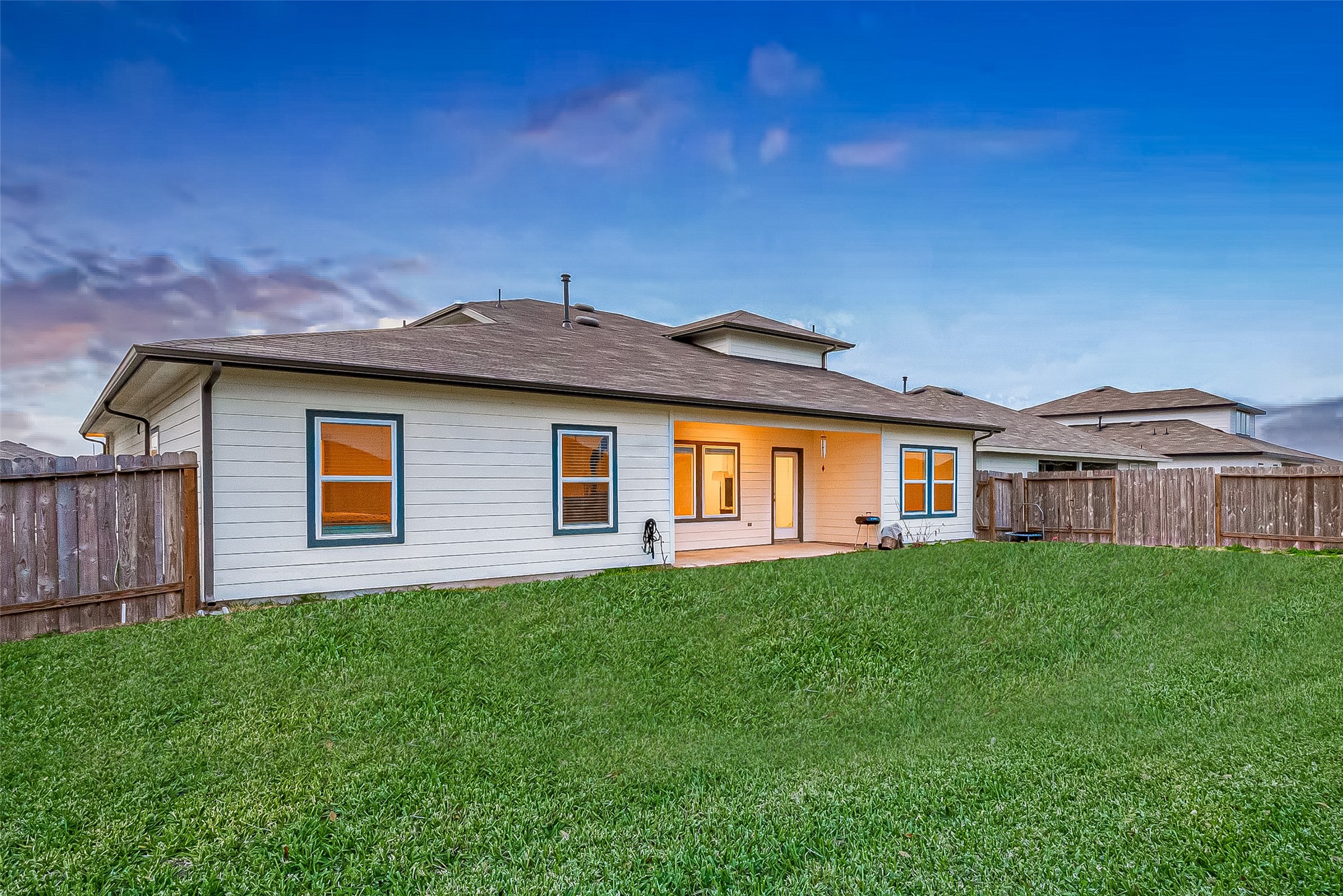 1815 Sandy Trail Lane Rosenberg, TX 77469 - Photo 41 of 47 a front view of house with yard and trees in the background