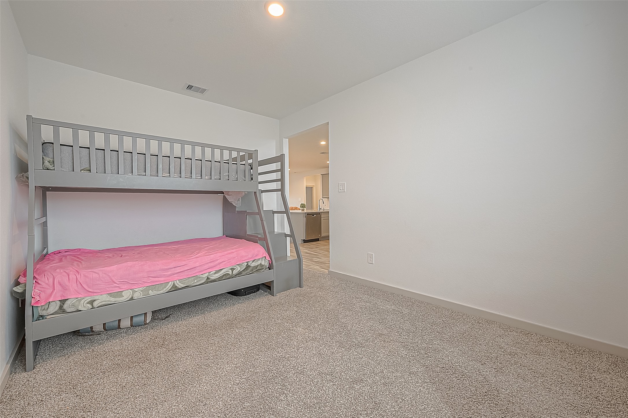 1815 Sandy Trail Lane Rosenberg, TX 77469 - Photo 9 of 47 a bedroom with a bed and a mirror