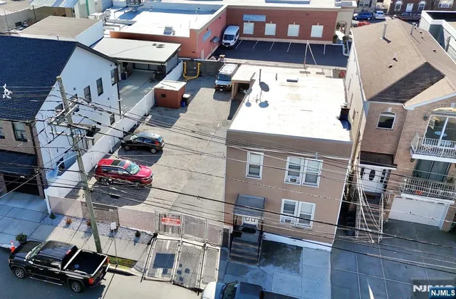 a view of a buildings with many windows