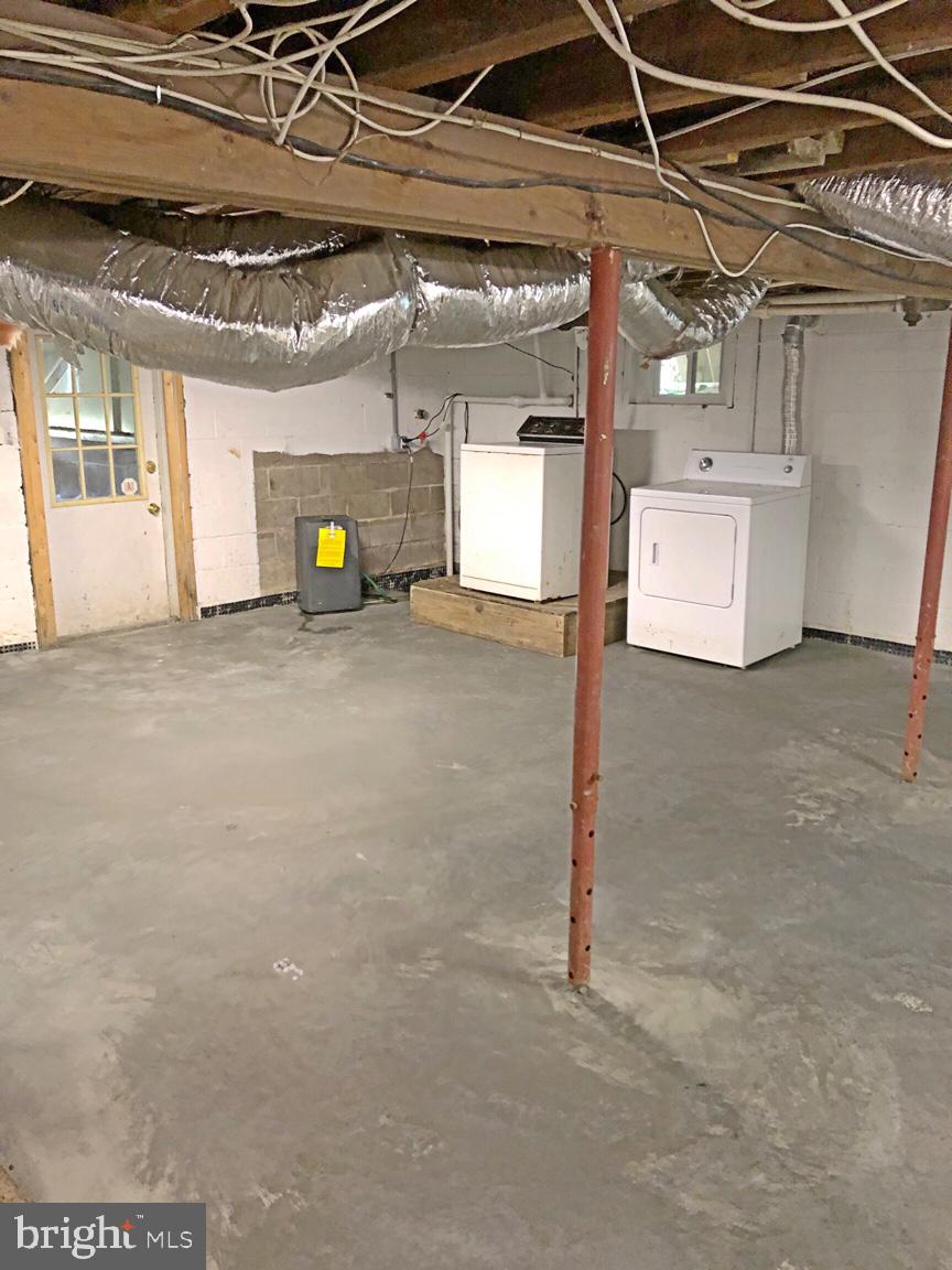 6199 Bethlehem Road Preston, MD 21655 - Photo 30 of 32 New Vapor Barrier and Freshly Cemented Floor.