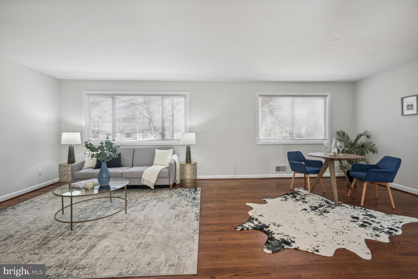 9713 Hedin Drive Silver Spring, MD 20903 - Photo 24 of 25 Open floor plan and w/ a wall of windows