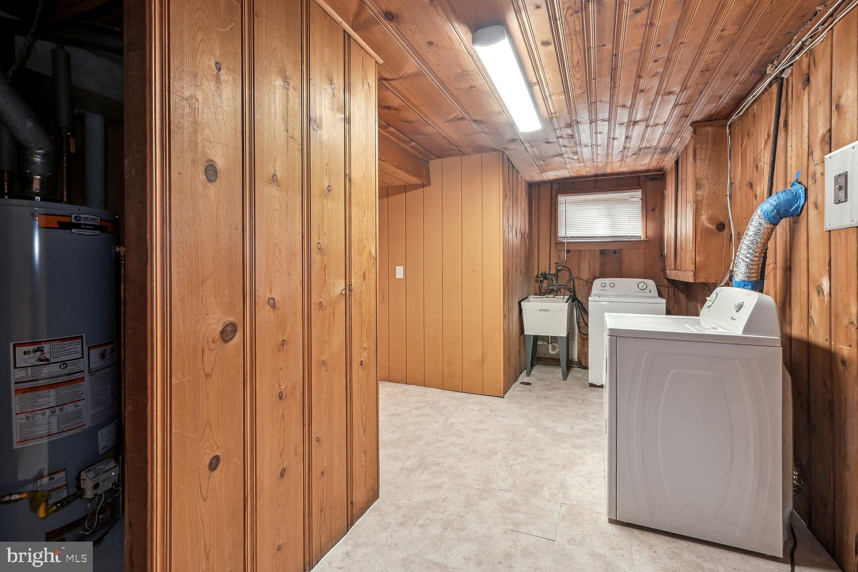 9713 Hedin Drive Silver Spring, MD 20903 - Photo 22 of 25 Laundry and storage