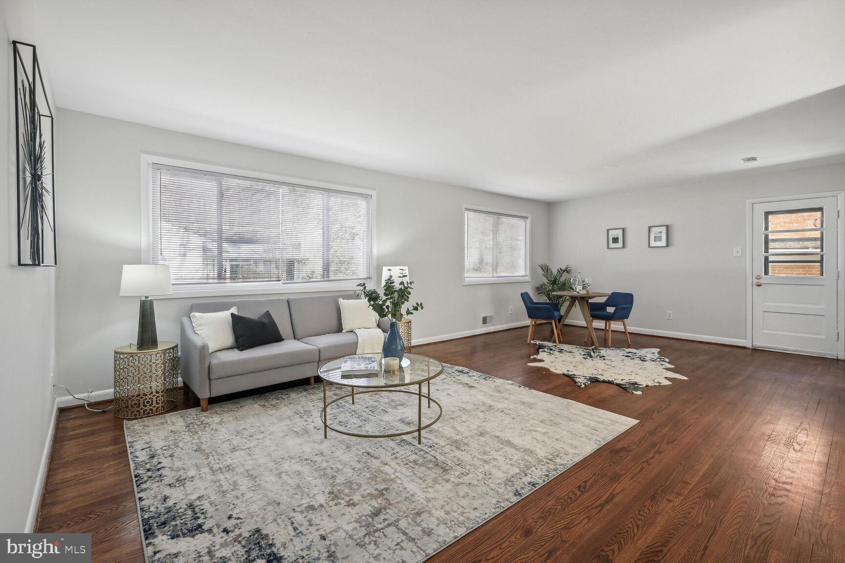 9713 Hedin Drive Silver Spring, MD 20903 - Photo 2 of 25 First floor features hardwood flooring throughout