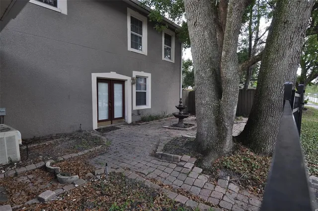 a backyard of a house with lots of green space