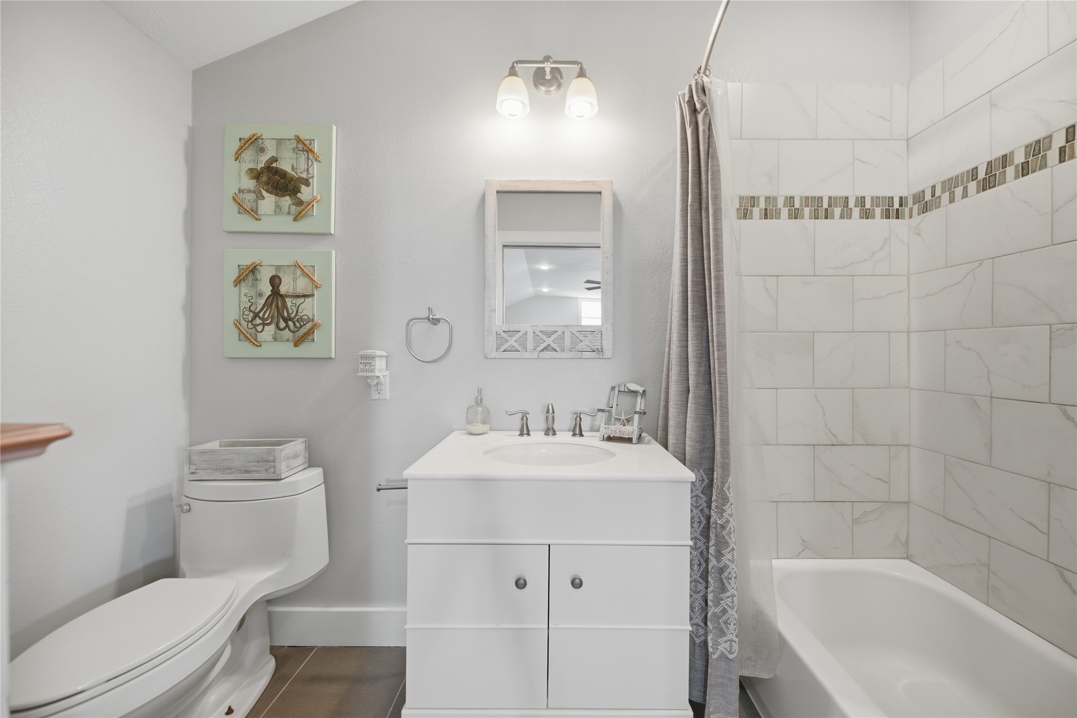 305 Affleck Road Brenham, TX 77833 - Photo 35 of 43 a bathroom with a sink a toilet and shower