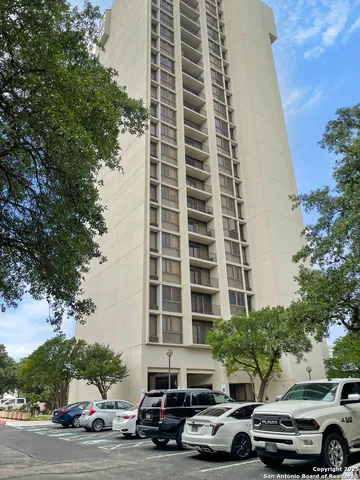 a car parked in front of a building
