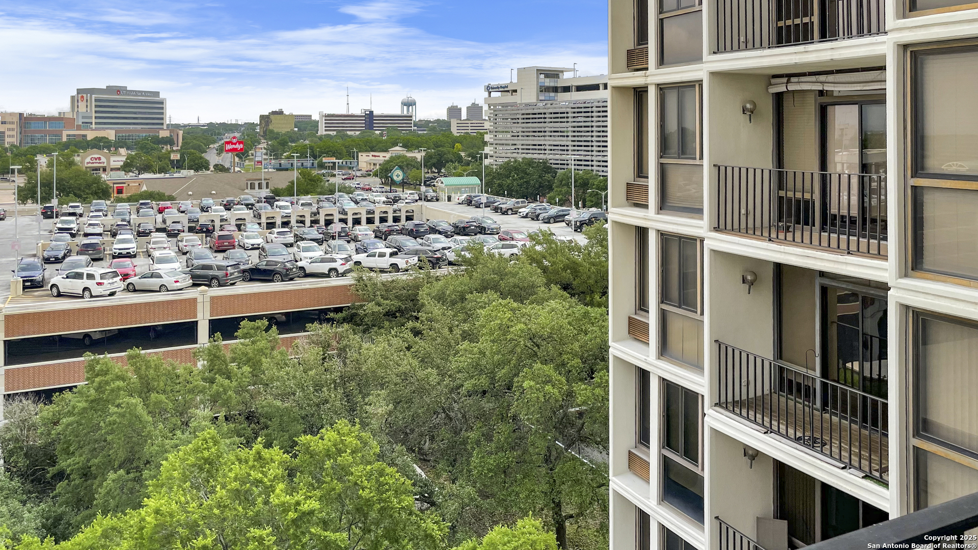 7701 Wurzbach Road, Unit 703 San Antonio, TX 78229 - Photo 12 of 28 a view of a city with tall buildings