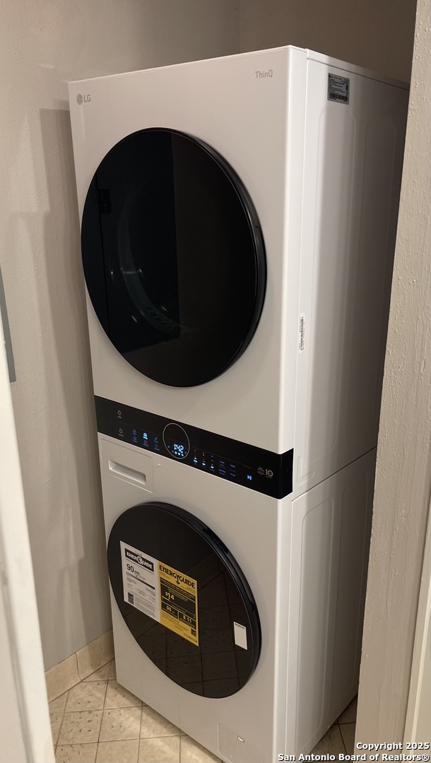 7701 Wurzbach Road, Unit 703 San Antonio, TX 78229 - Photo 13 of 28 a close up view of a washer and dryer