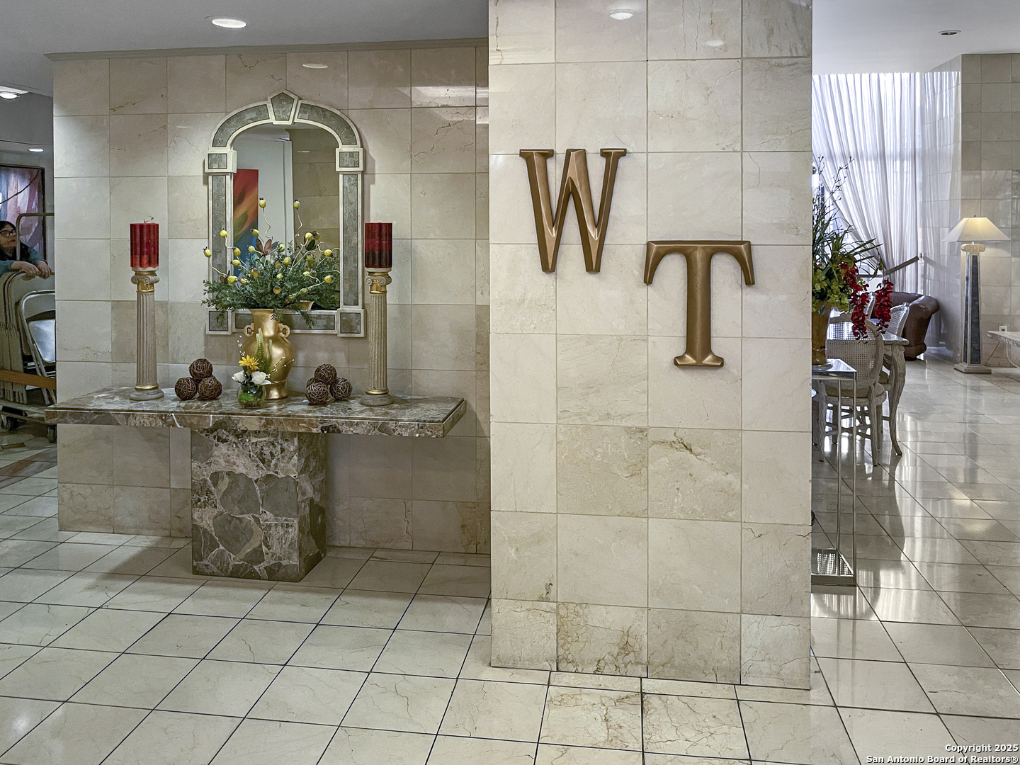 7701 Wurzbach Road, Unit 703 San Antonio, TX 78229 - Photo 15 of 28 a view of a bathroom with mirror