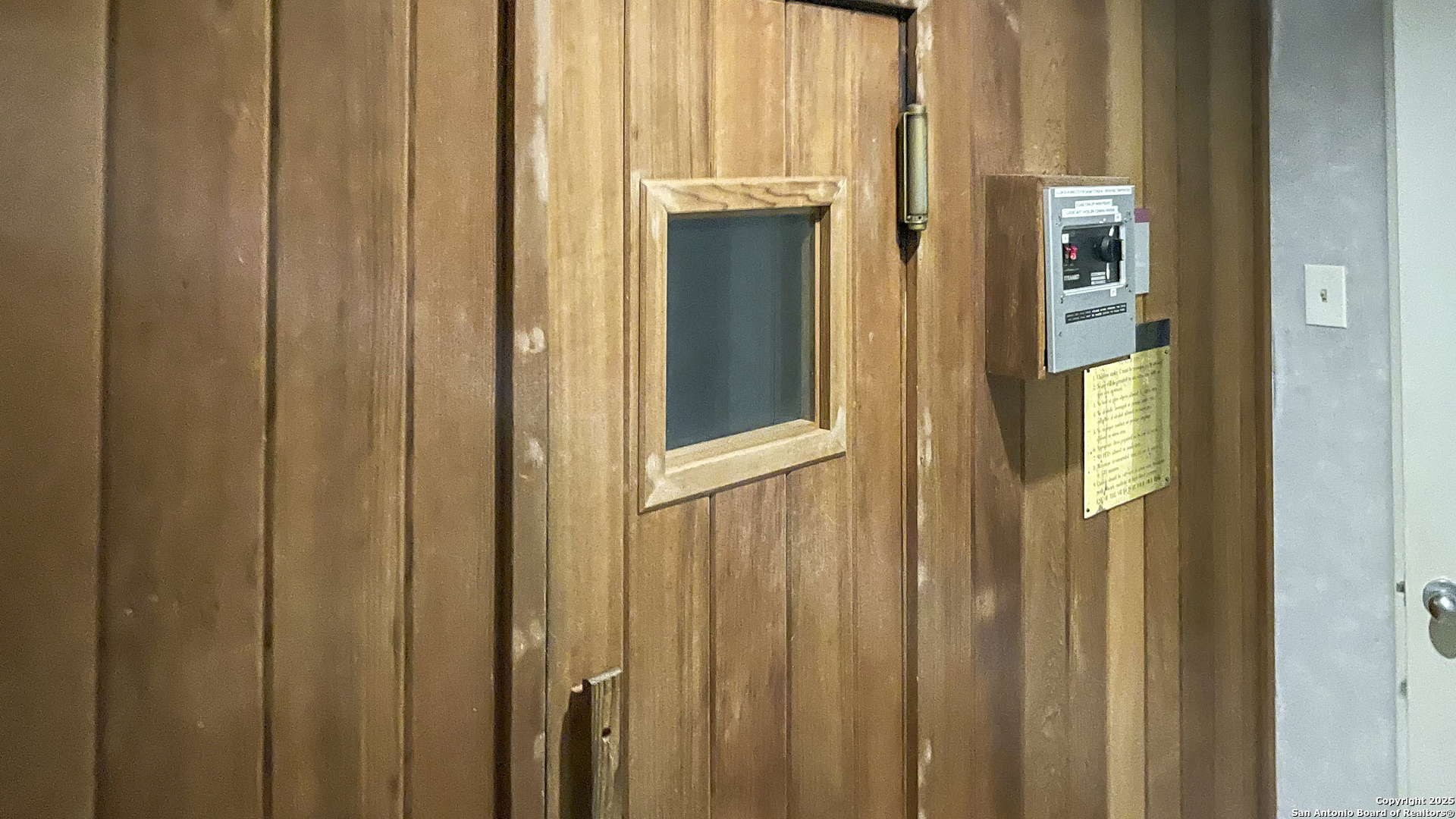 7701 Wurzbach Road, Unit 703 San Antonio, TX 78229 - Photo 22 of 28 a view of a bathroom with a door
