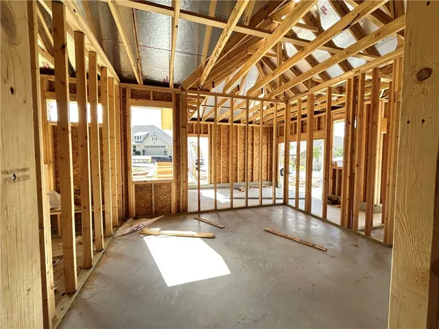 a view of an empty room with a sliding door