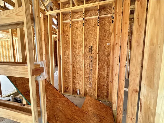a view of a balcony with wooden floor and stairs