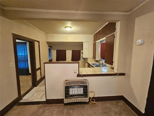 a room with table and mirror