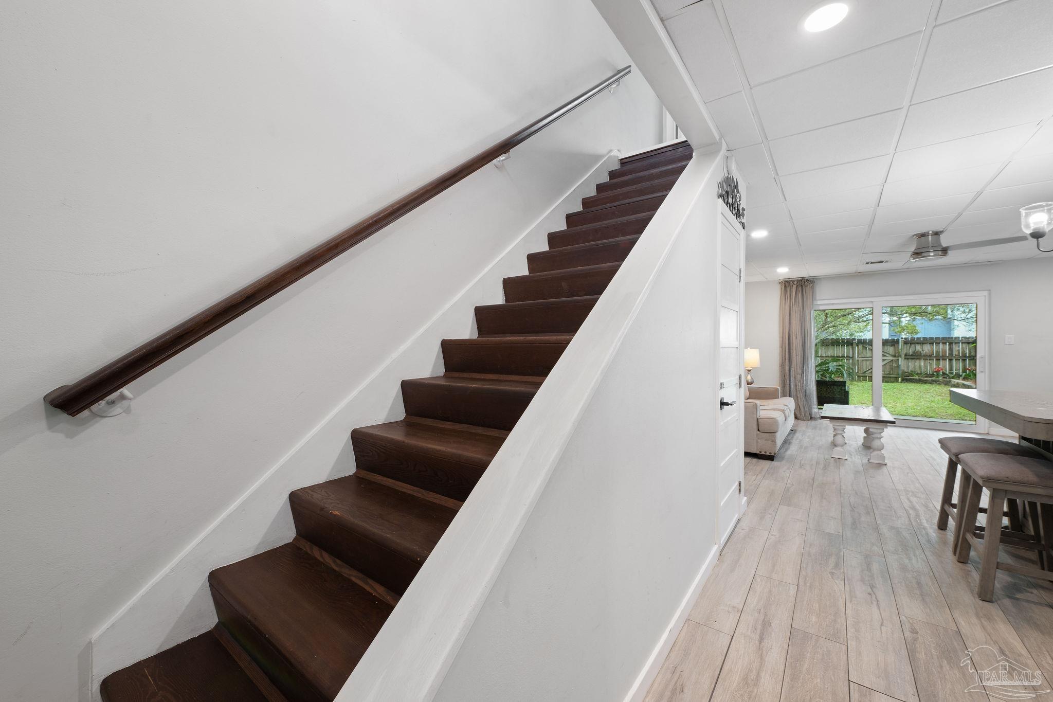 201 Pensacola Beach Road, Unit D24 Gulf Breeze, FL 32561 - Photo 13 of 29 a view of entryway and workspace with wooden floor