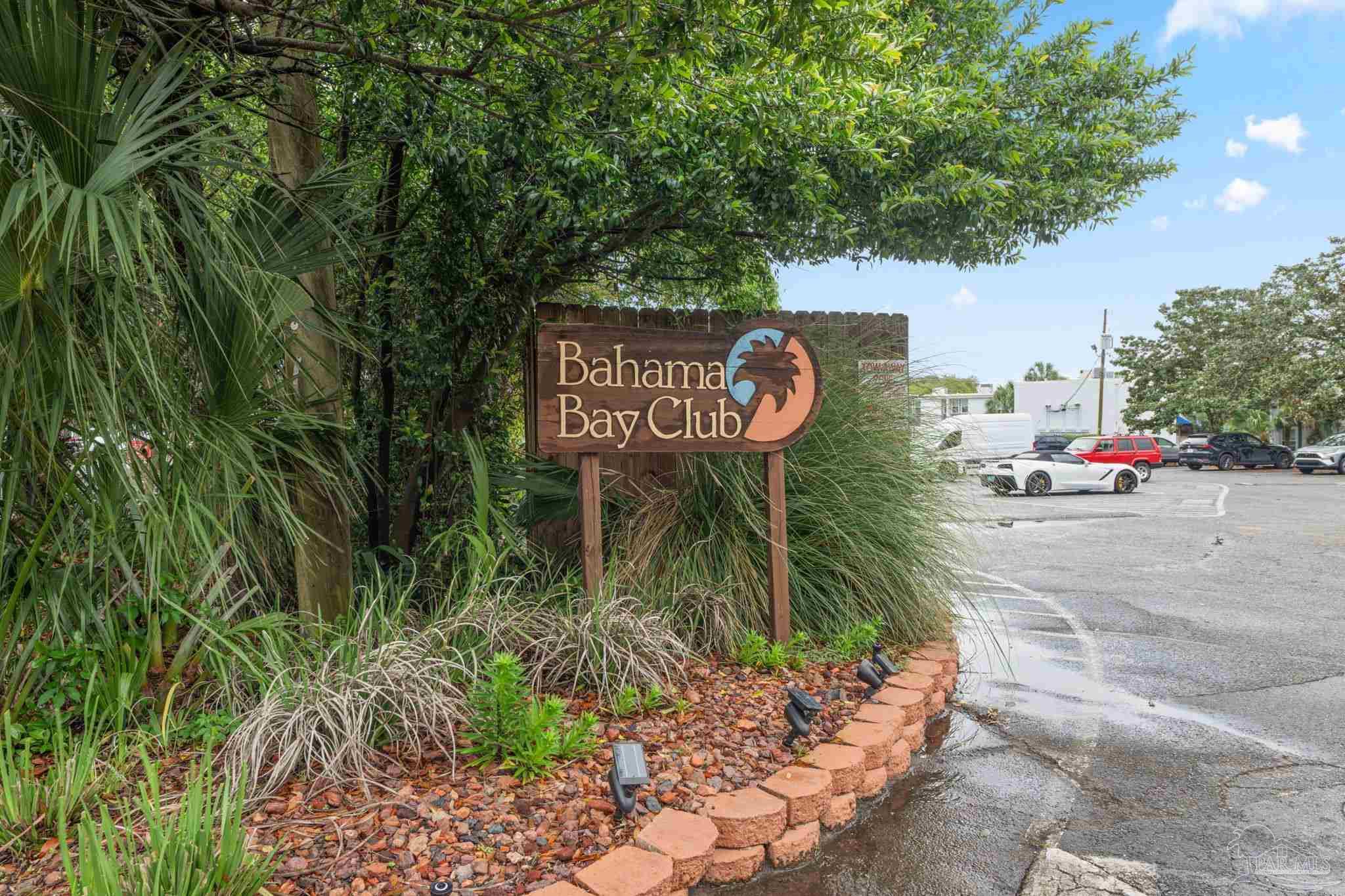 201 Pensacola Beach Road, Unit D24 Gulf Breeze, FL 32561 - Photo 23 of 29 a sign that is on a tree