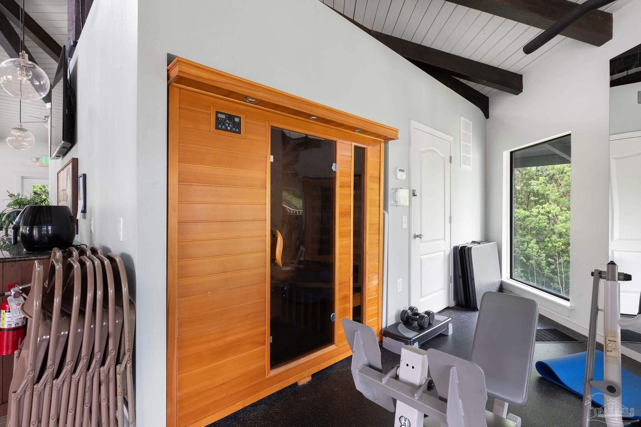 201 Pensacola Beach Road, Unit D24 Gulf Breeze, FL 32561 - Photo 26 of 29 a dining room with furniture and a floor to ceiling window