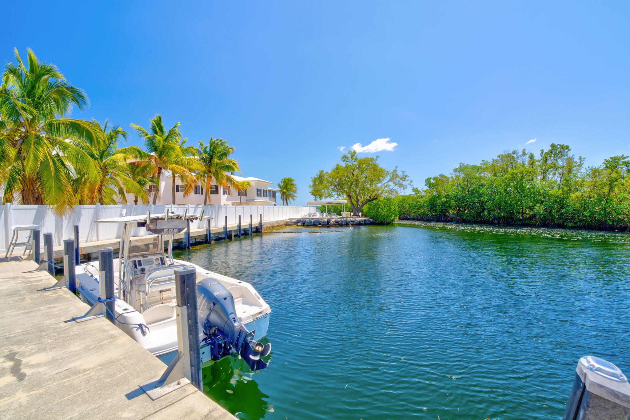 446 Largo Avenue Key Largo, FL 33037 - Photo 14 of 18 a view of a lake with a house