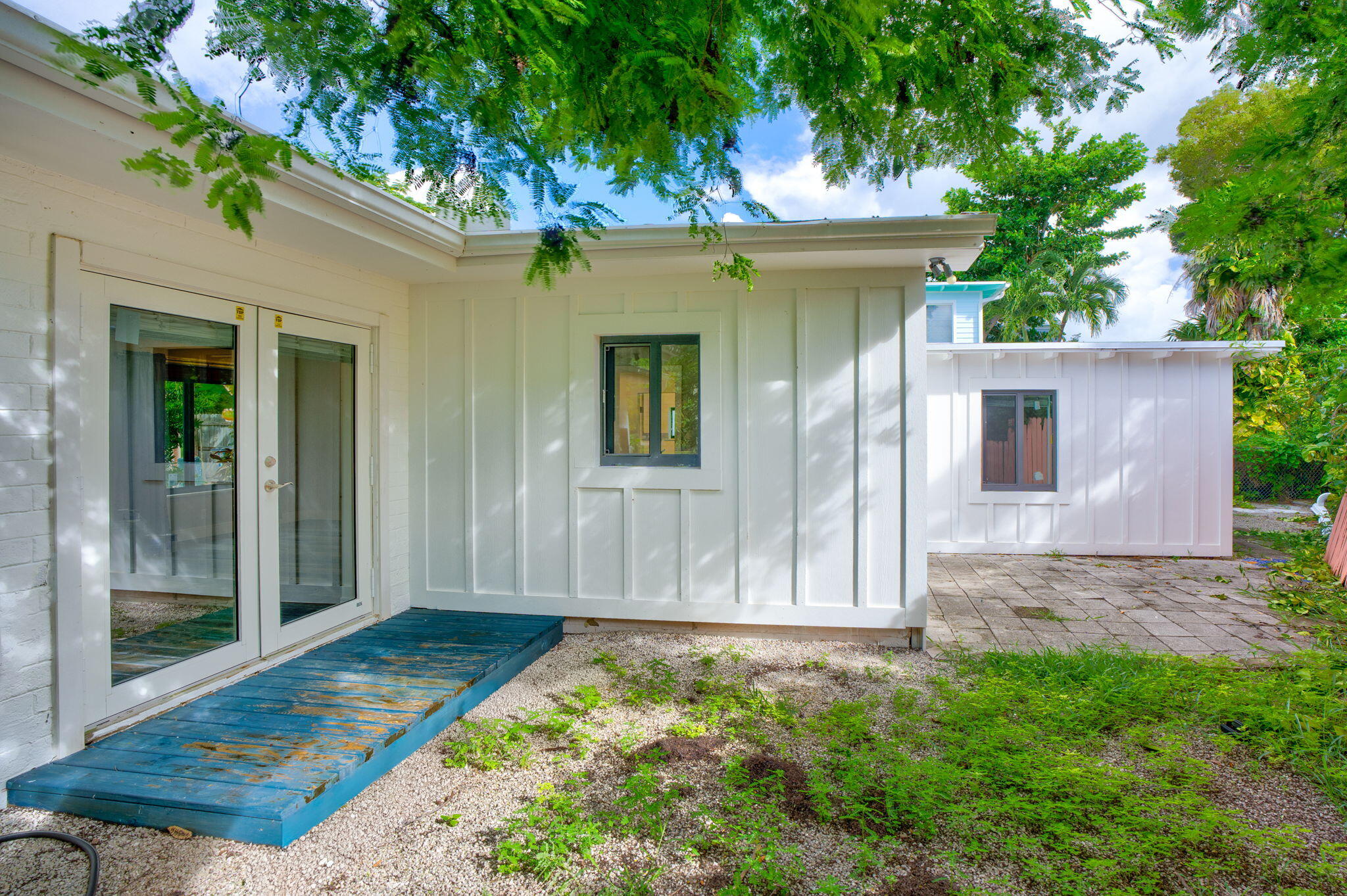 446 Largo Avenue Key Largo, FL 33037 - Photo 16 of 18 front view of a house with a yard