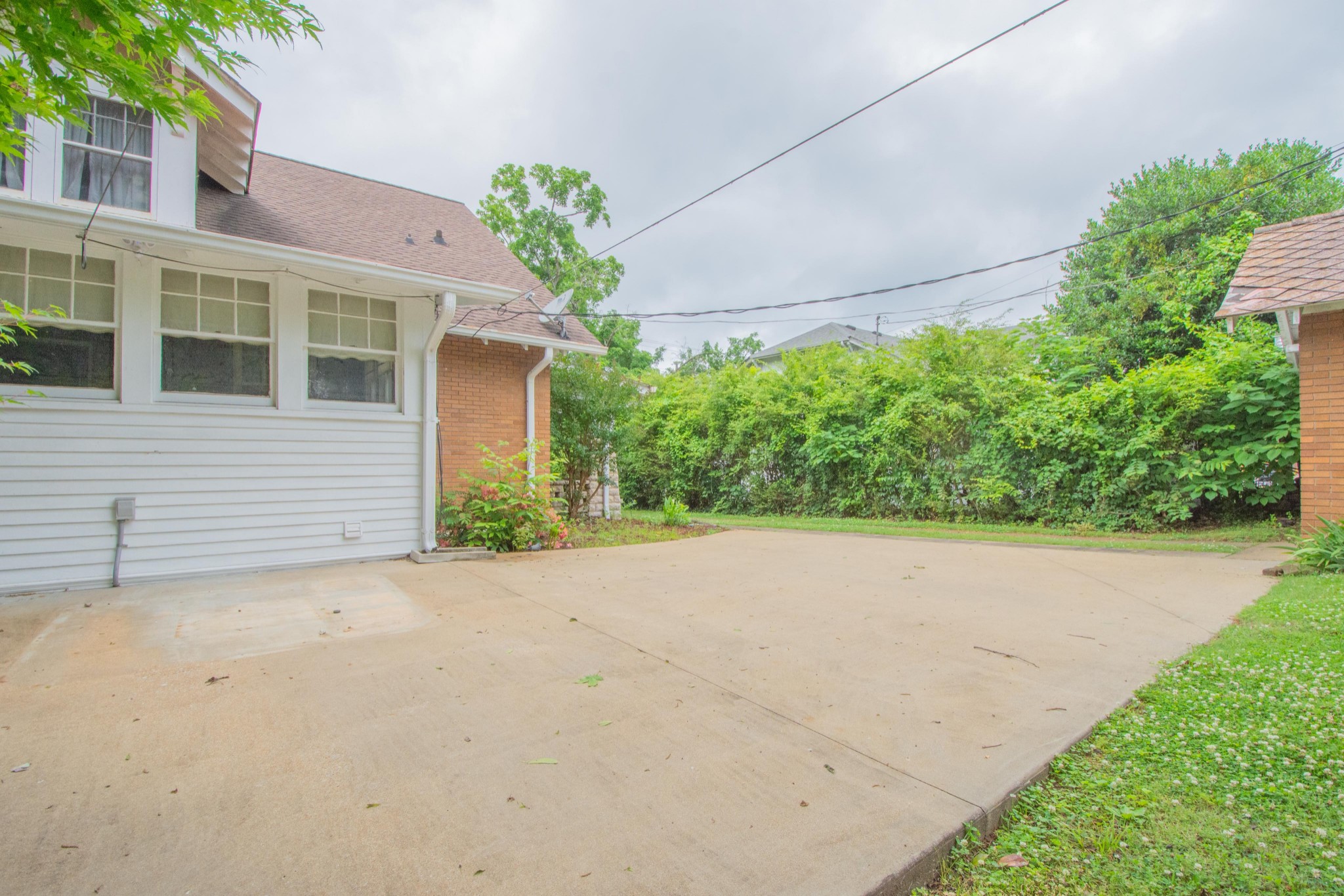 311 South 3rd Street Pulaski, TN 38478 - Photo 38 of 44 a view of a house with a yard and potted plants