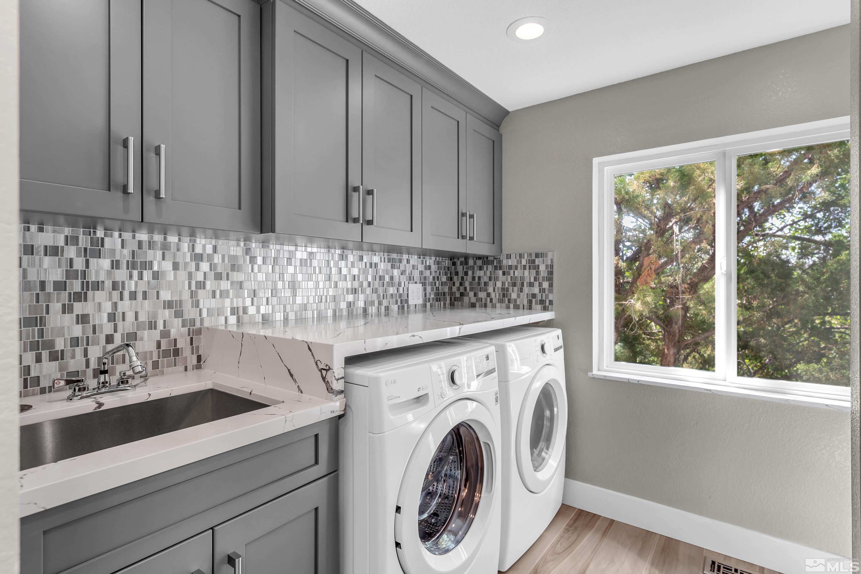 2370 Fireside Circle Reno, NV 89509 - Photo 17 of 29 a utility room with dryer and washer