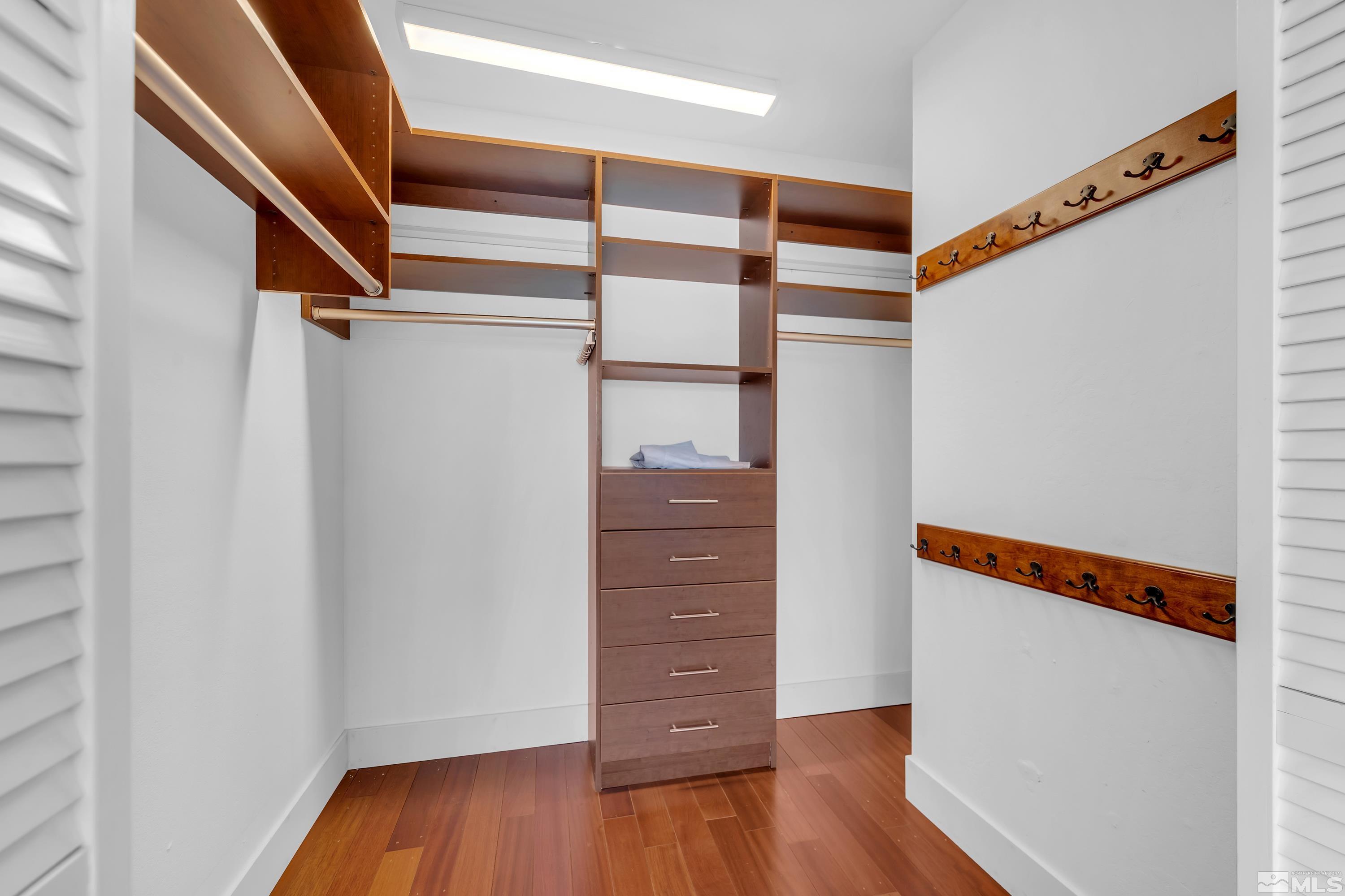 2370 Fireside Circle Reno, NV 89509 - Photo 27 of 29 a view of walk in closet with wooden floor