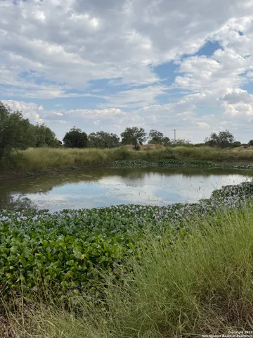 a view of a lake with a city