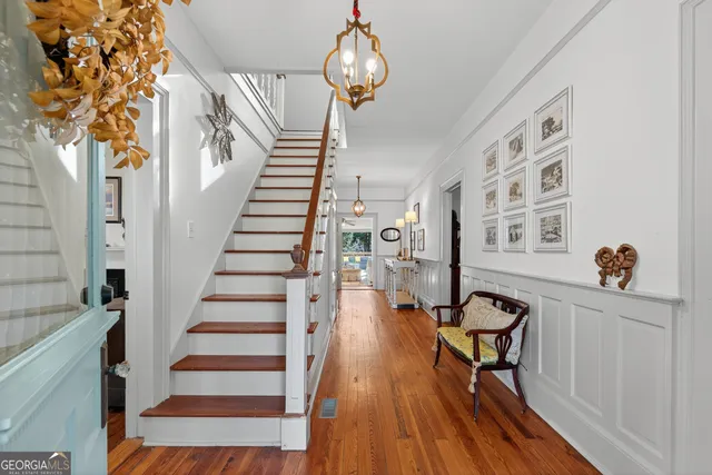 a view of entryway with wooden floor