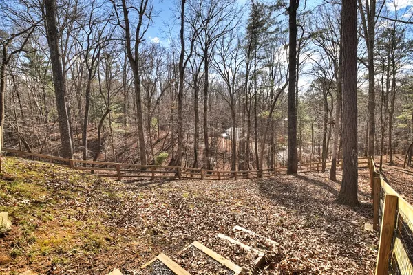 a view of a backyard of the house