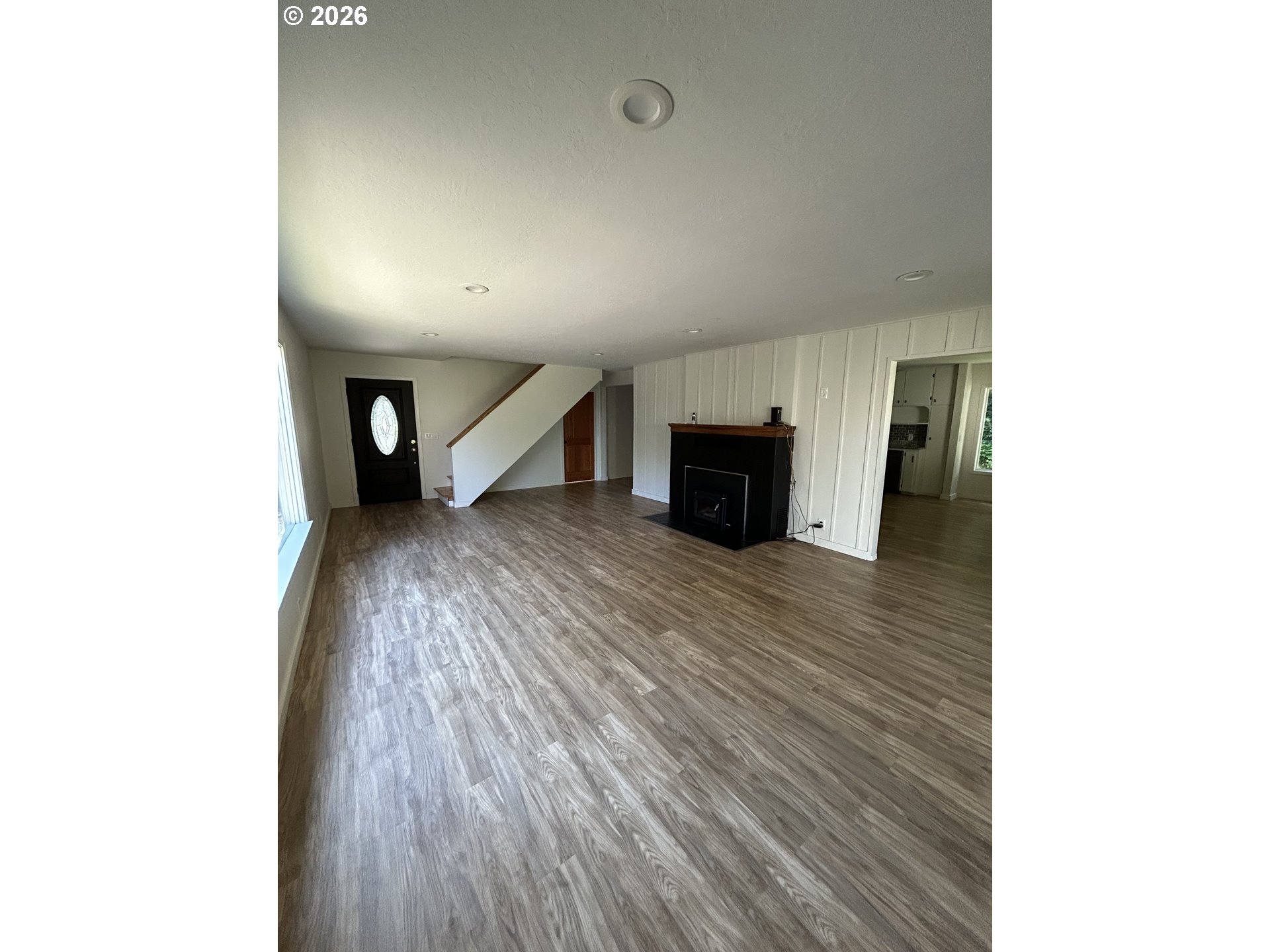 62356 Olive Barber Road Coos Bay, OR 97420 - Photo 18 of 34 a view of empty room with a fireplace