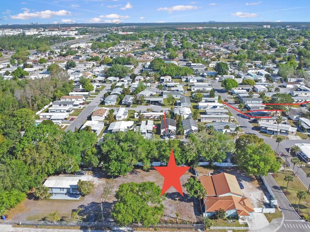0 Donegan Kissimmee, FL 34741 - Photo 6 of 10 an aerial view of residential houses with outdoor space and street view