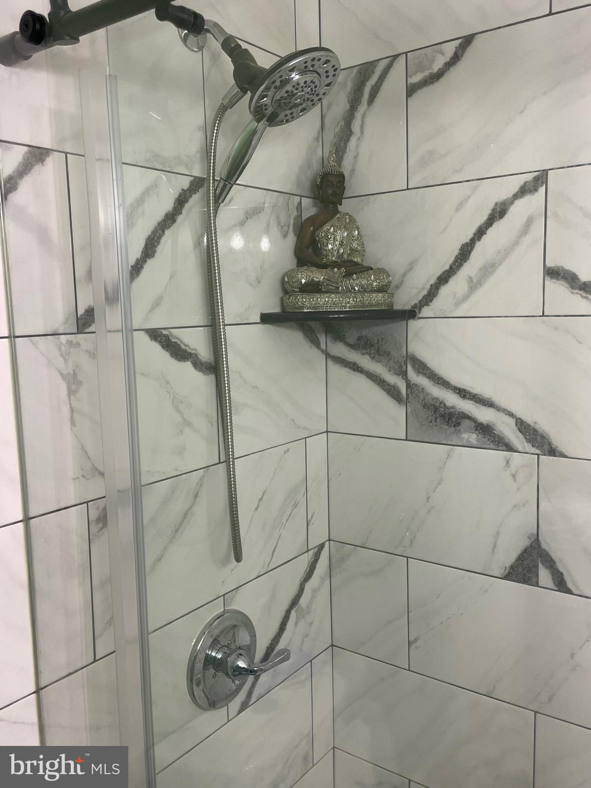 735 Grant Road Folcroft, PA 19032 - Photo 32 of 39 Serene shower with marble elegance.