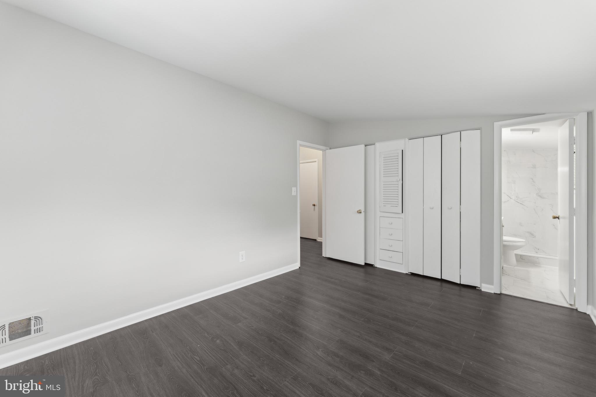600 Sisson Street Silver Spring, MD 20902 - Photo 16 of 28 a view of an empty room with wooden floor