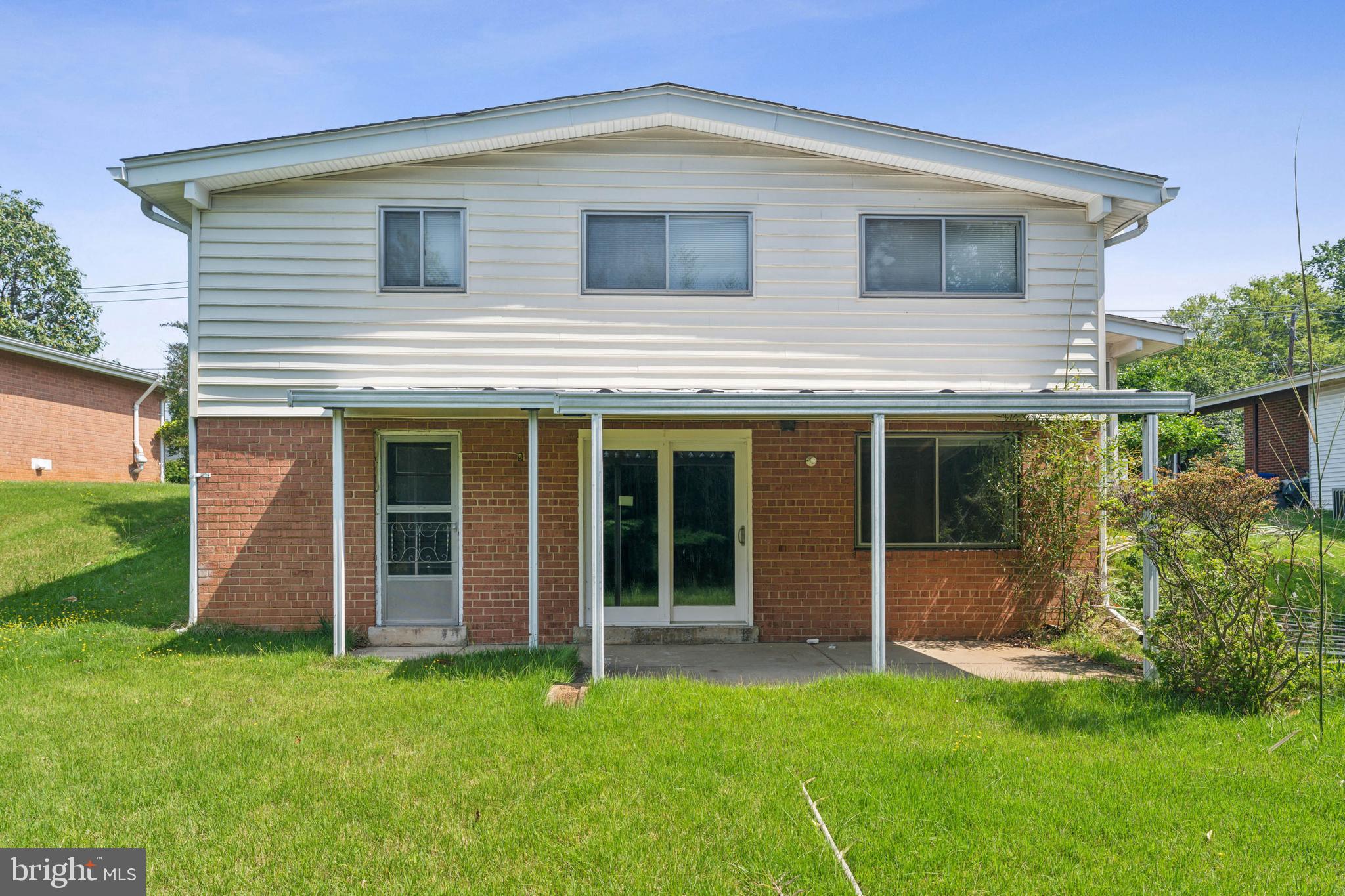 600 Sisson Street Silver Spring, MD 20902 - Photo 22 of 28 front view of a house with a yard