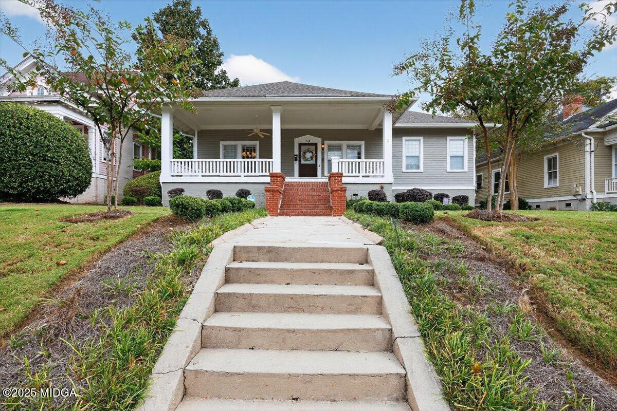 173 Pierce Avenue Macon, GA 31204 - Photo 1 of 20 a front view of a house with a yard