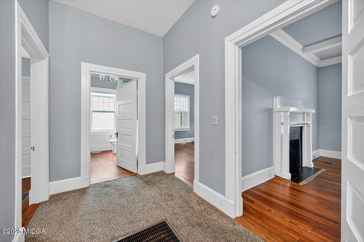 173 Pierce Avenue Macon, GA 31204 - Photo 8 of 20 a view of livingroom with hardwood floor and bedroom view