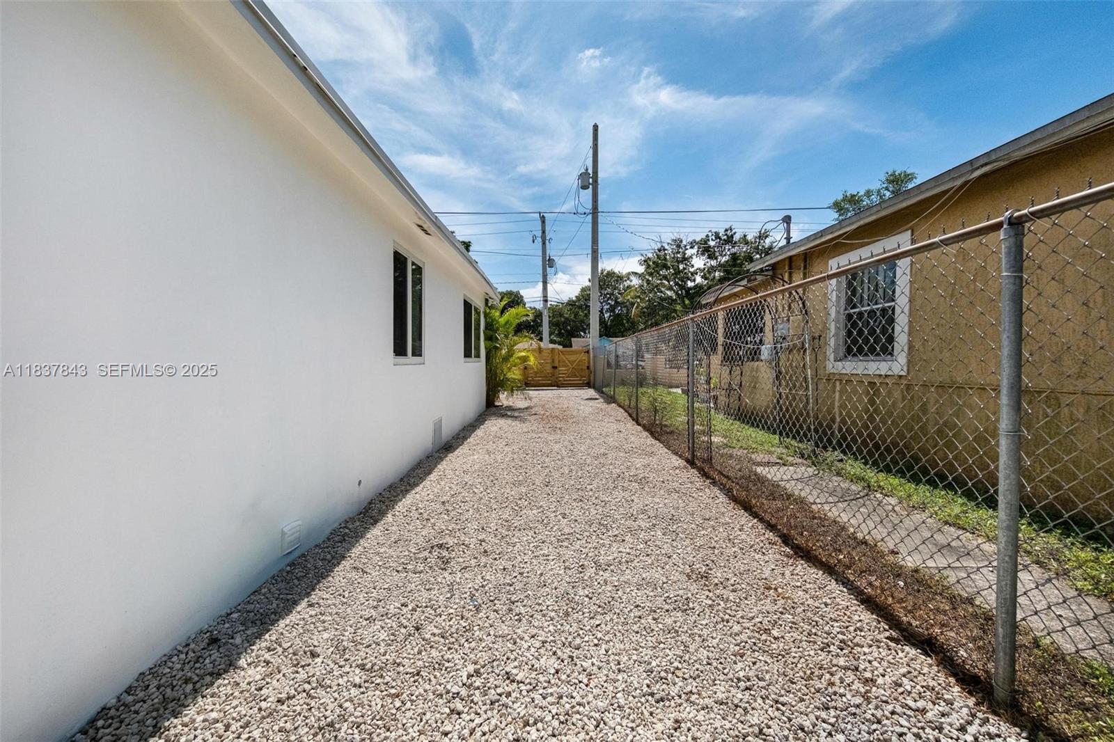 5900 Northwest 5th Court Miami, FL 33127 - Photo 28 of 35 a view of a house with a backyard