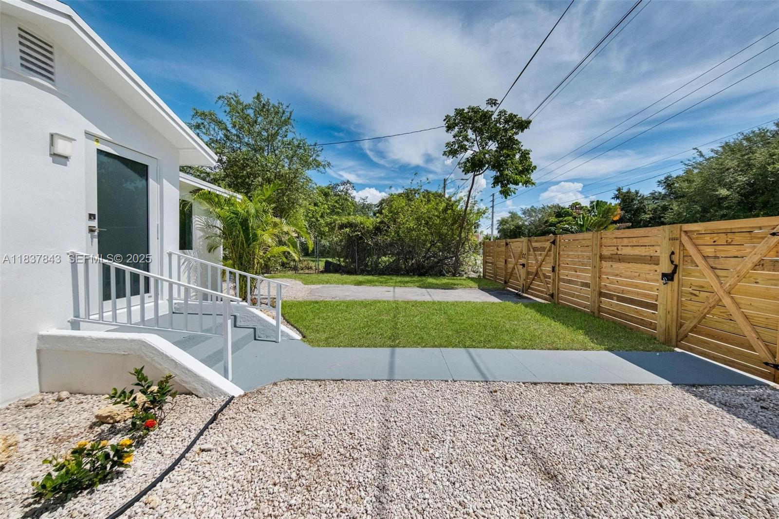 5900 Northwest 5th Court Miami, FL 33127 - Photo 34 of 35 a view of a house with a yard