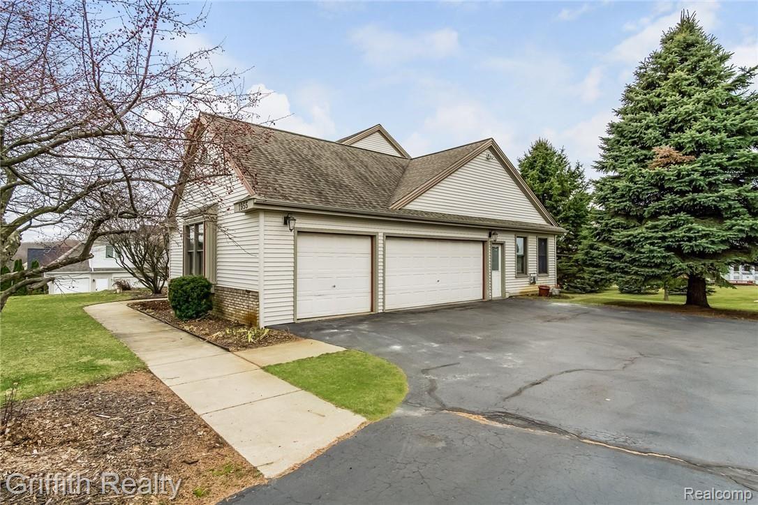 1955 Clover Ridge Drive Howell, MI 48843 - Photo 24 of 28 023-photo-front-view-6941594.jpg
