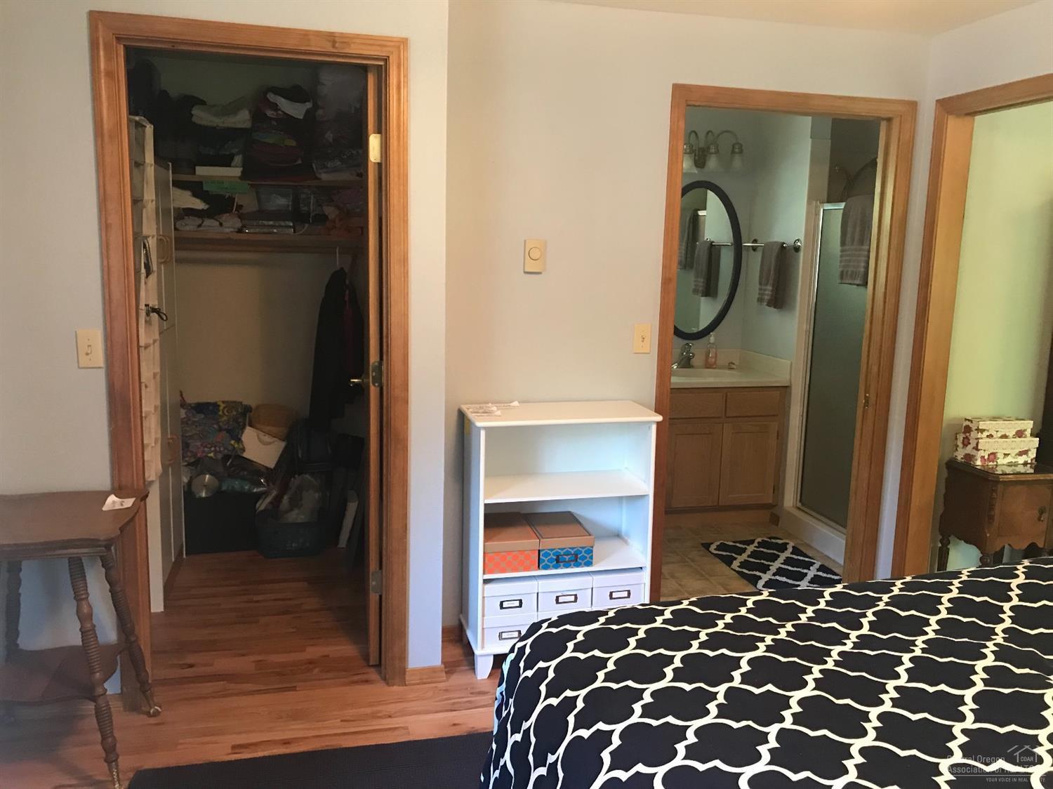 61225 Victory Loop Bend, OR 97702 - Photo 21 of 21 Walk-in closet and bathroom with oversiz