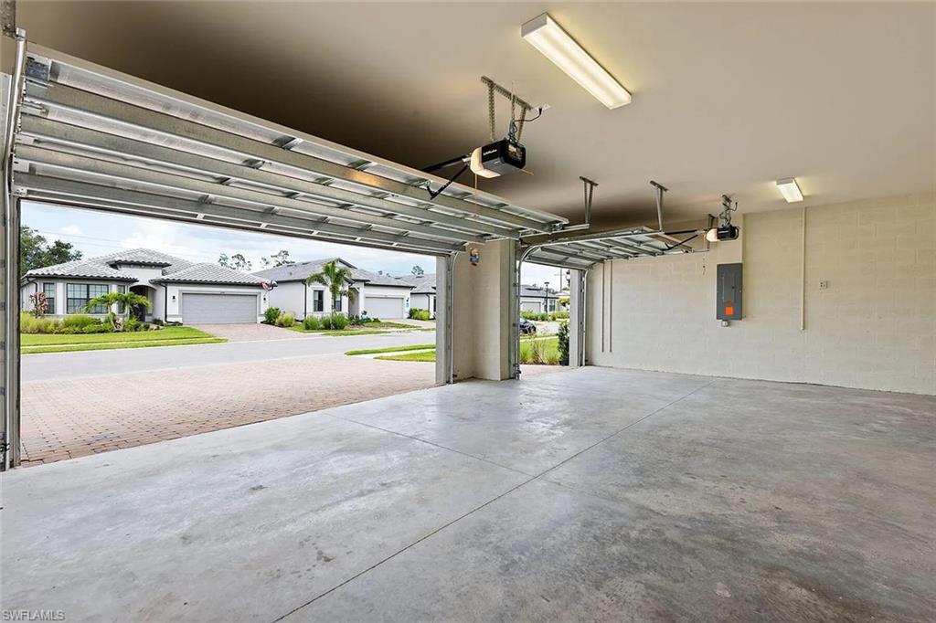 2085 Yellowfin Circle Naples, FL 34114 - Photo 35 of 50 a view of an indoor garage