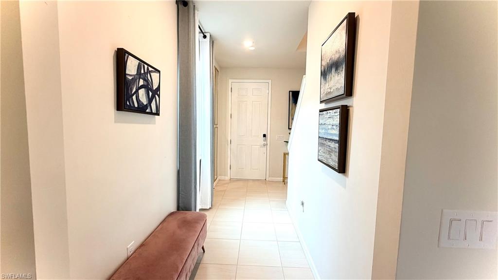 2085 Yellowfin Circle Naples, FL 34114 - Photo 4 of 50 a view of a hallway with white walls
