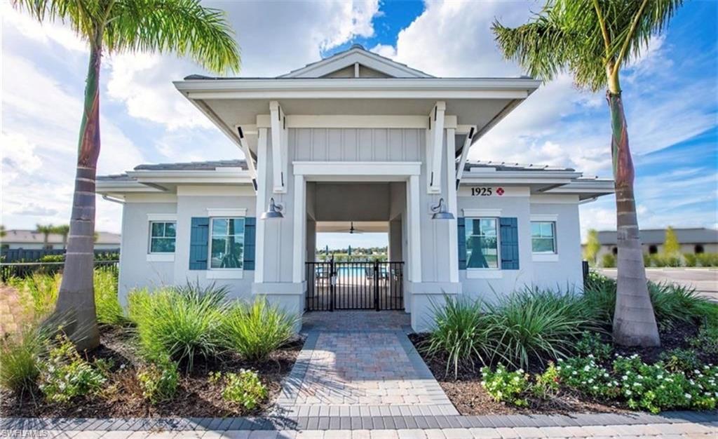 2085 Yellowfin Circle Naples, FL 34114 - Photo 43 of 50 a front view of a house with garden