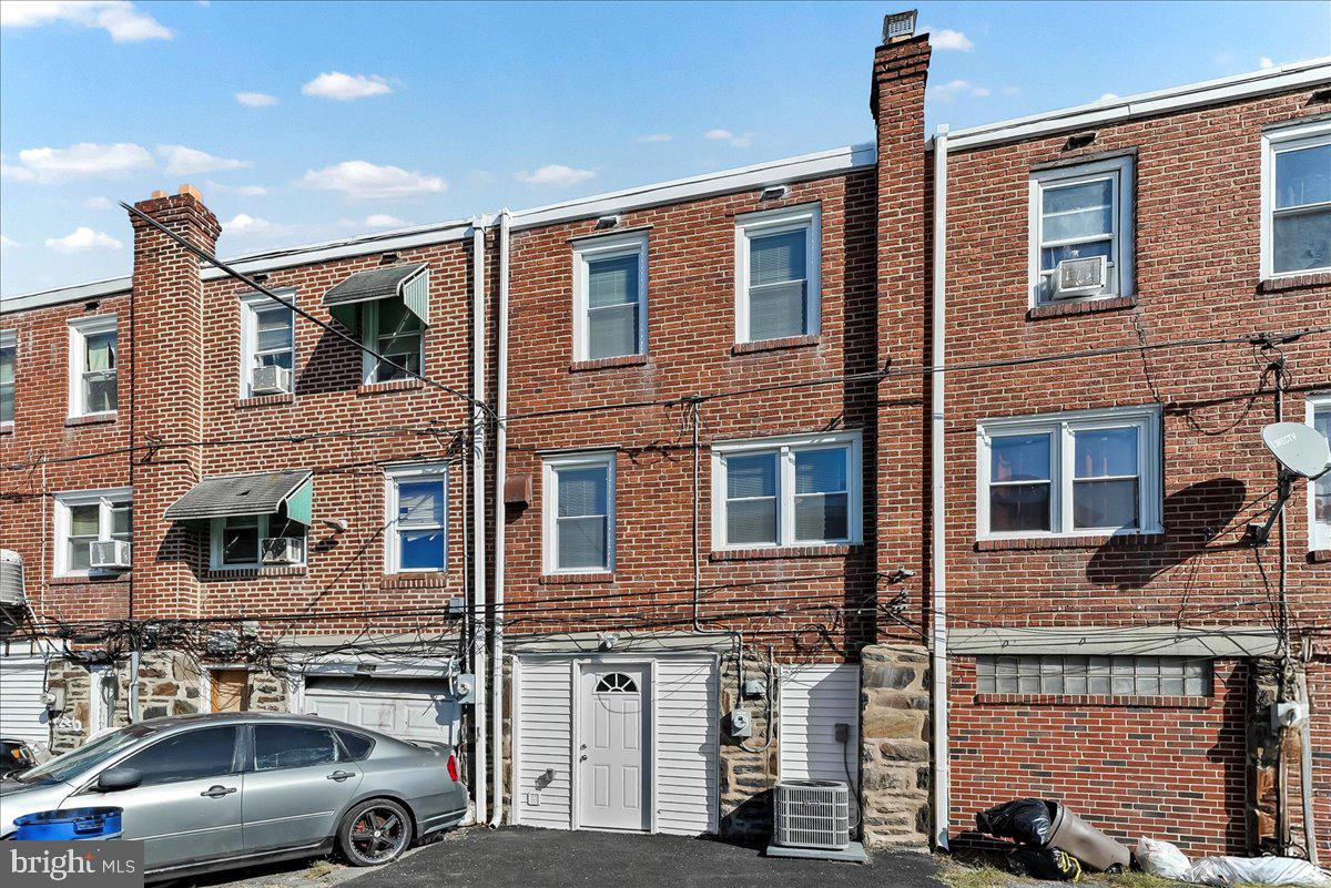 1232 Edgehill Road Darby, PA 19023 - Photo 20 of 20 a view of a car park in front of a building