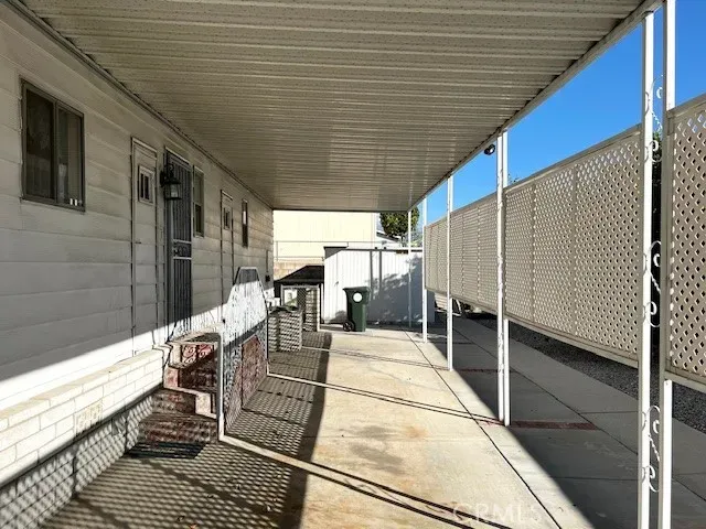a view of a balcony with chairs